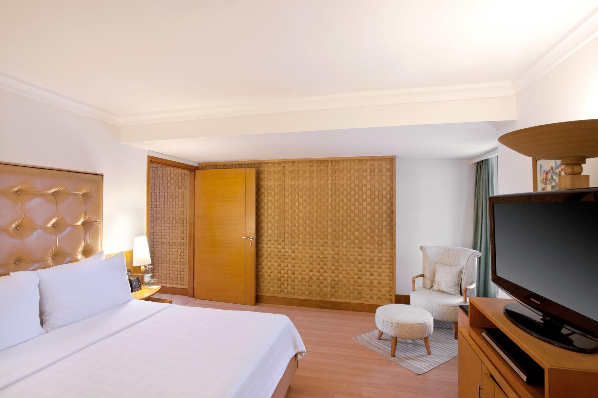 โรงแรมไทรเด้นท์ เชนไน ภายนอก รูปภาพ A bedroom at the hotel