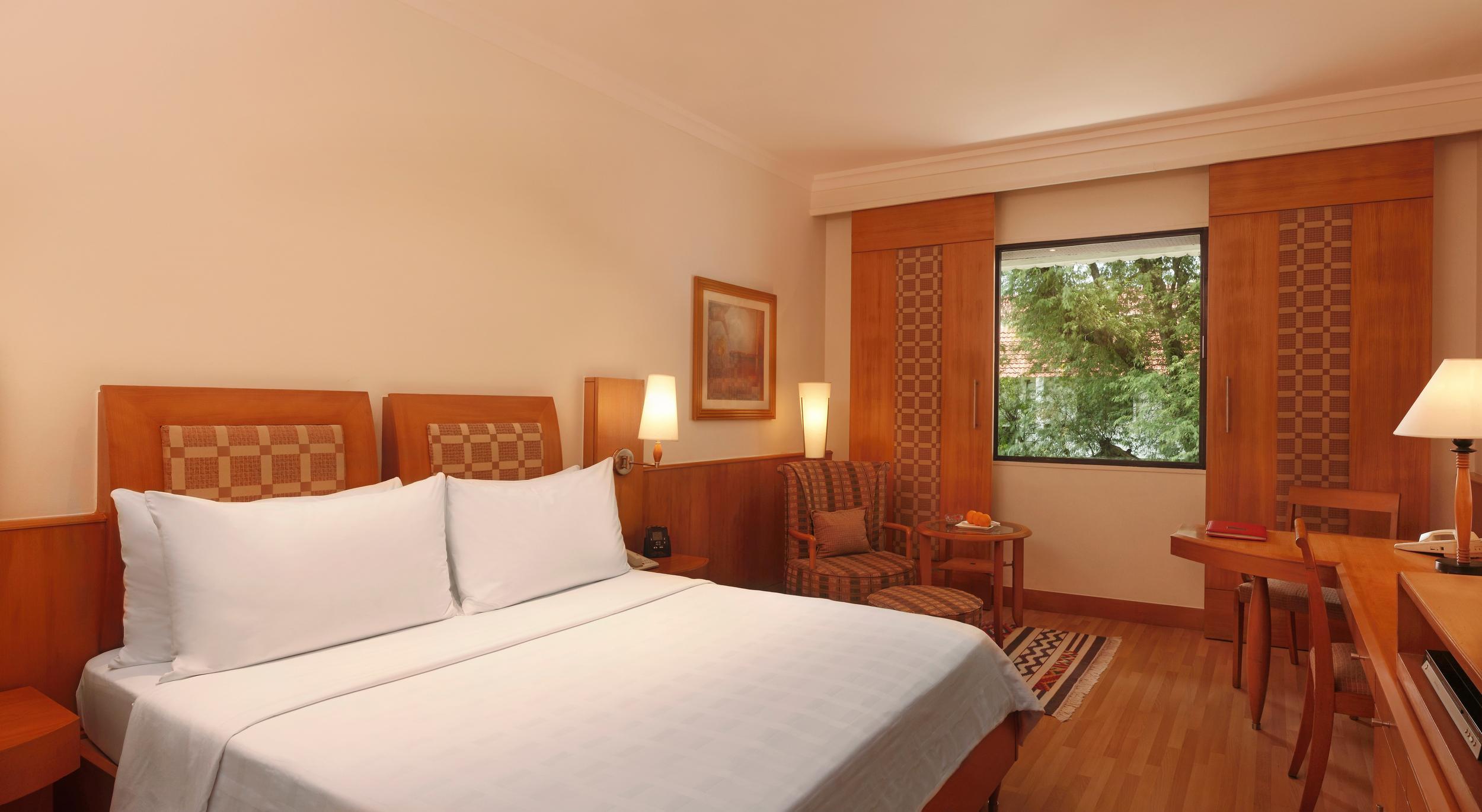 โรงแรมไทรเด้นท์ เชนไน ภายนอก รูปภาพ A room at the Taj Bengal