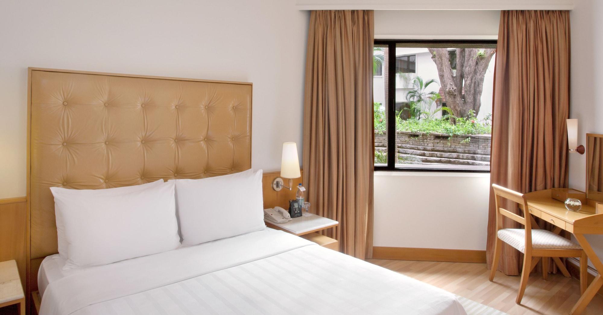 โรงแรมไทรเด้นท์ เชนไน ภายนอก รูปภาพ A room at the hotel