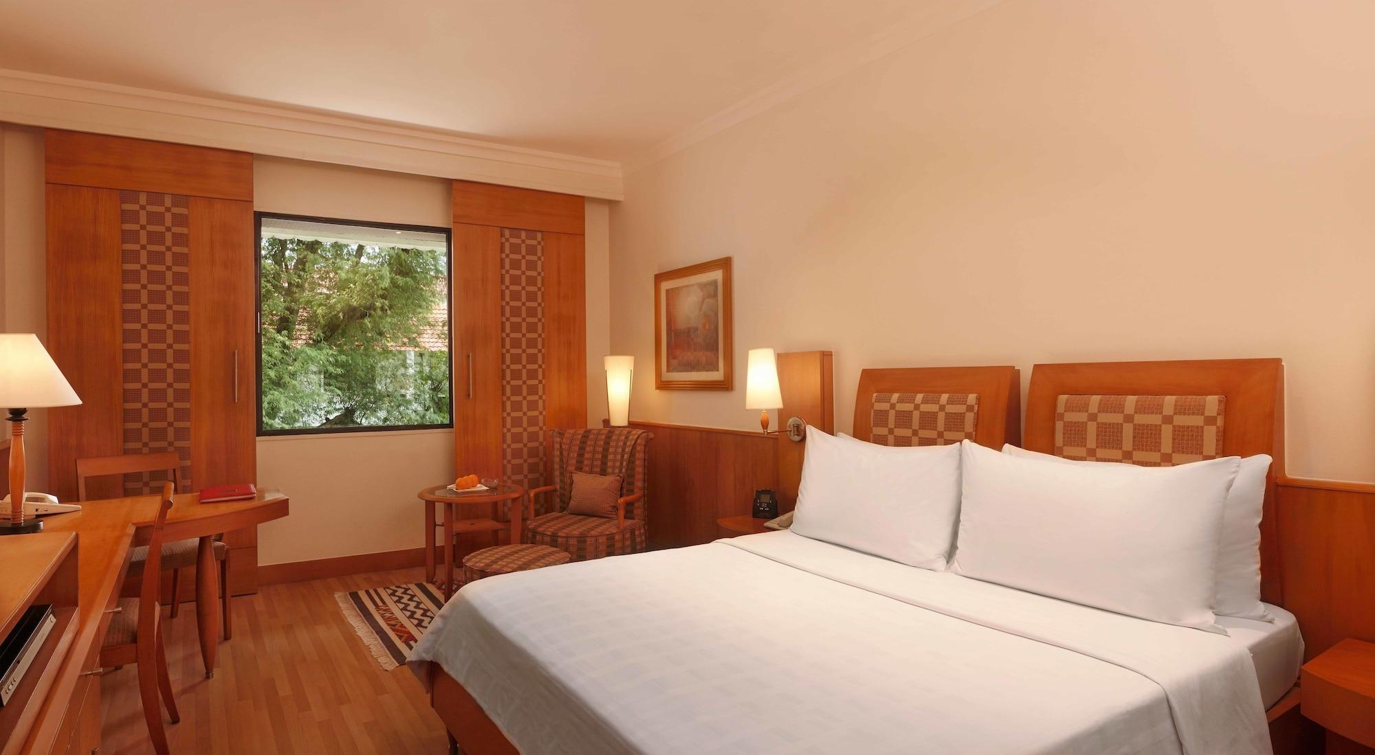 โรงแรมไทรเด้นท์ เชนไน ภายนอก รูปภาพ A room at the Taj Bengal